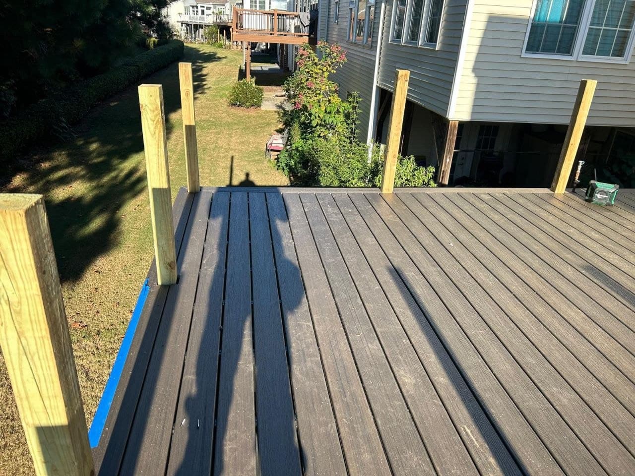 Dark composite decking with new railing posts